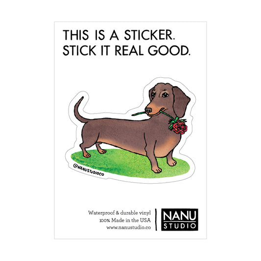 An illustrated sticker showing a wiener dog with a rose in its mouth