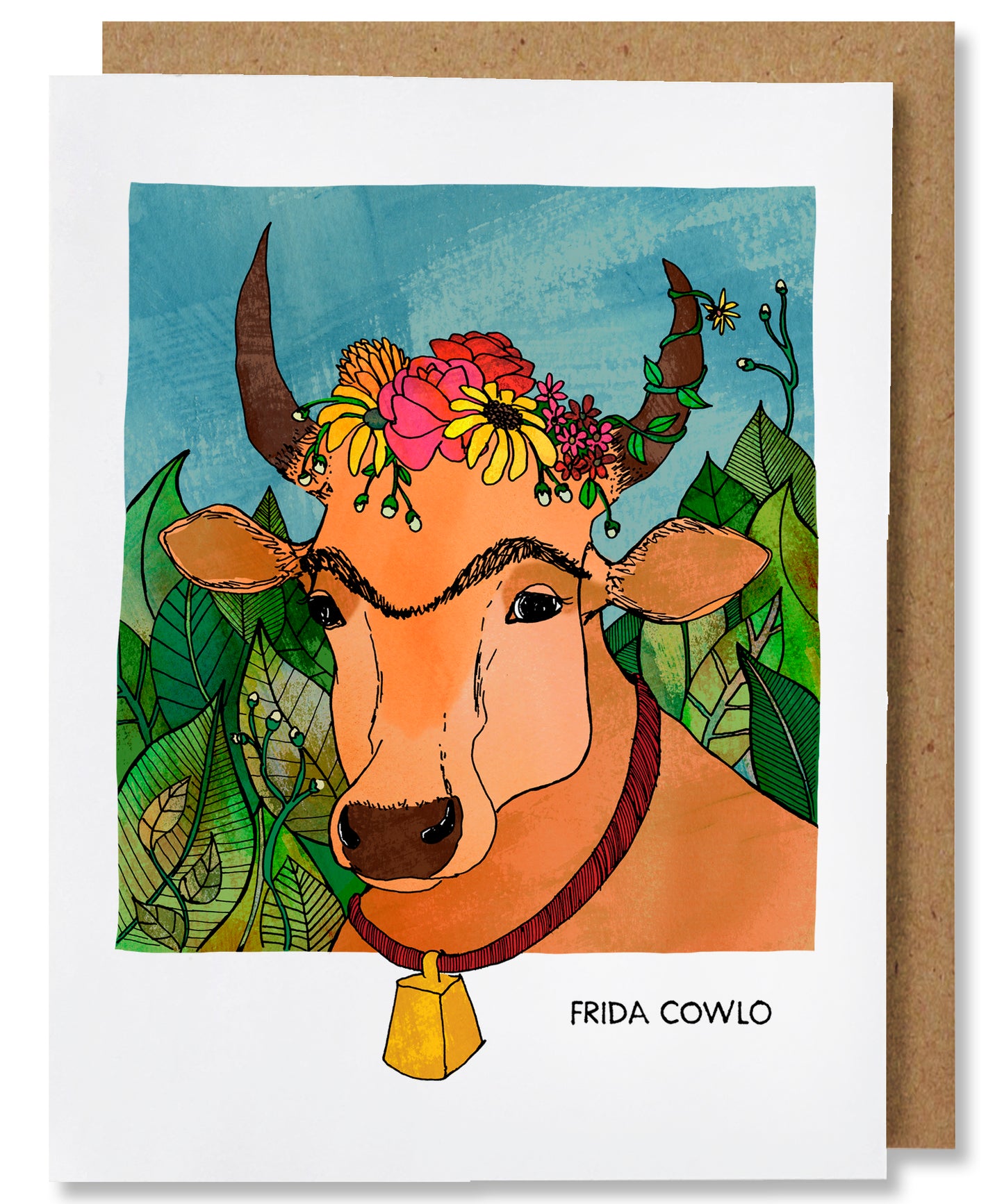 The Frida Cowlo greeting card depicts a portrait of Frida Kahlo as a tan cow with a unibrow and flowers along the top of her head between her horns. A vine with a flower twirls its way up the right-side horn. The cow is also wearing a cow bell that hangs on a red collar. The cow is in front of a wall of lush, green foliage and blue sky. This card is placed with a brown kraft envelope.