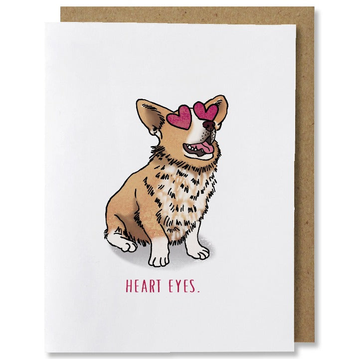 Illustrated love card with a seated corgi with red hearts instead of eyes, captioned "heart eyes" in red